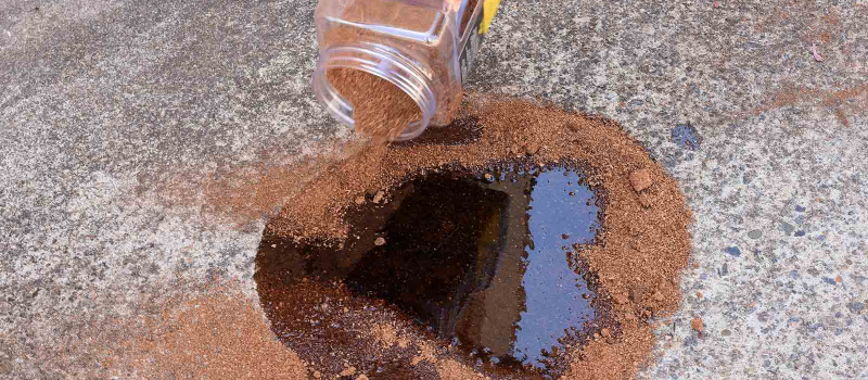 SpillFix Absorbing Oil on Concrete